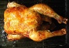 Хрупкаво печено пиле с масло